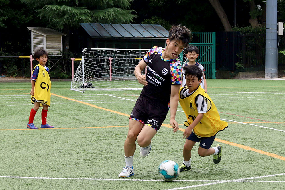 熊谷選手とボールの取り合い