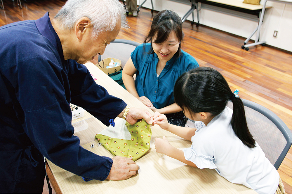 会長の釼持がサポート