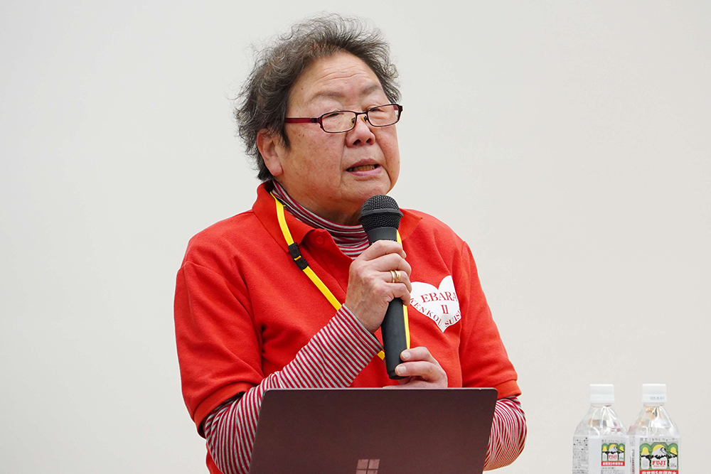 挨拶をする村吉事業部会会長の写真