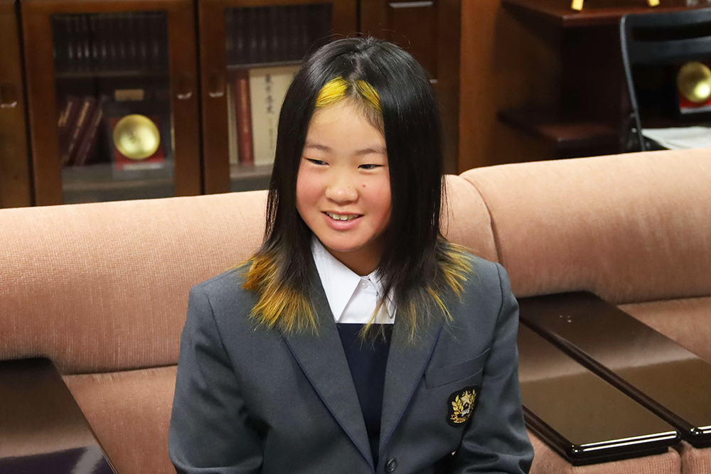報告する大栗さんの画像