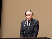 CSR講演会で挨拶する濱野区長