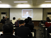 報告会では、濱野区長のメッセージも流された